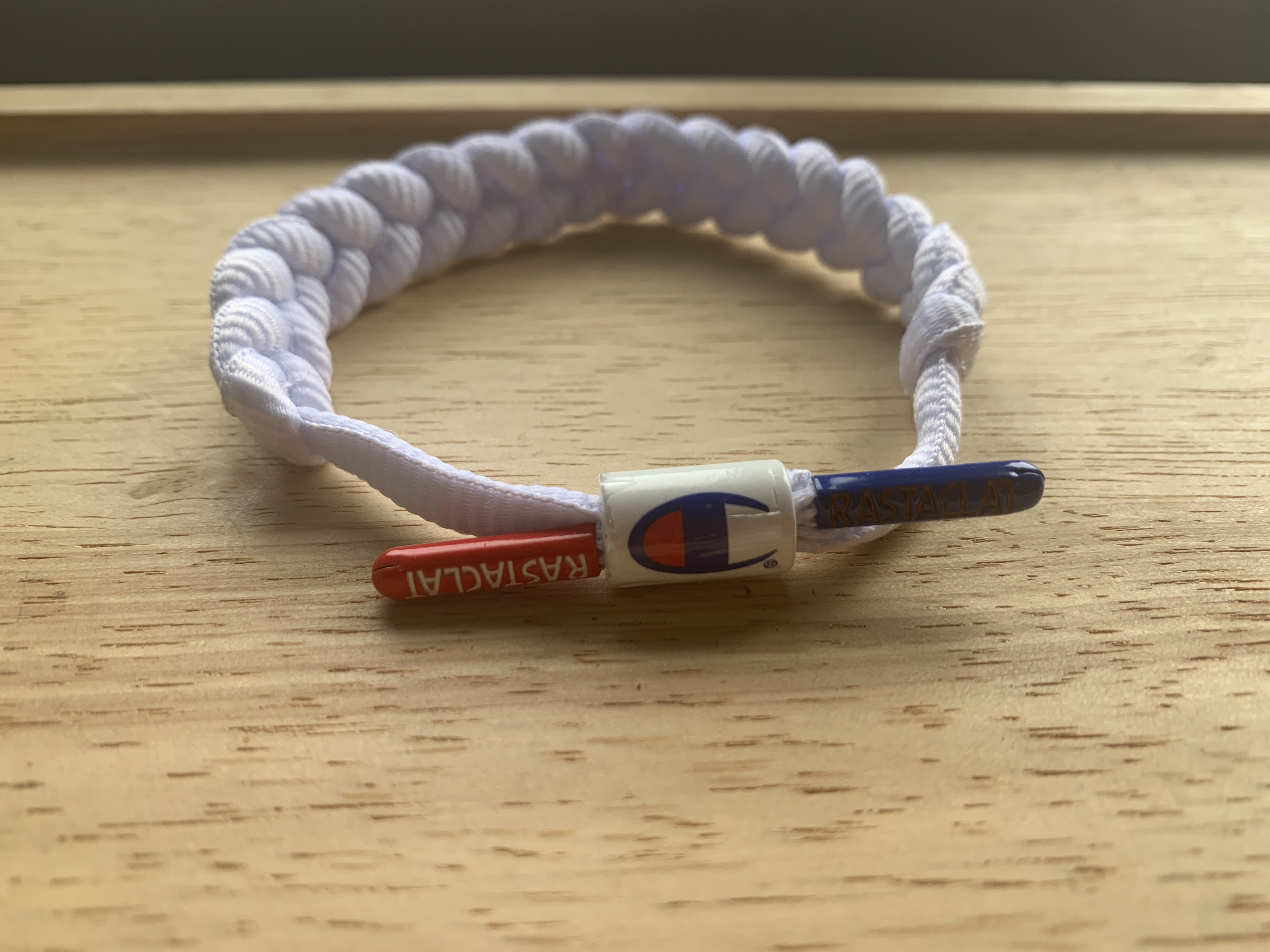 Champion x store rastaclat