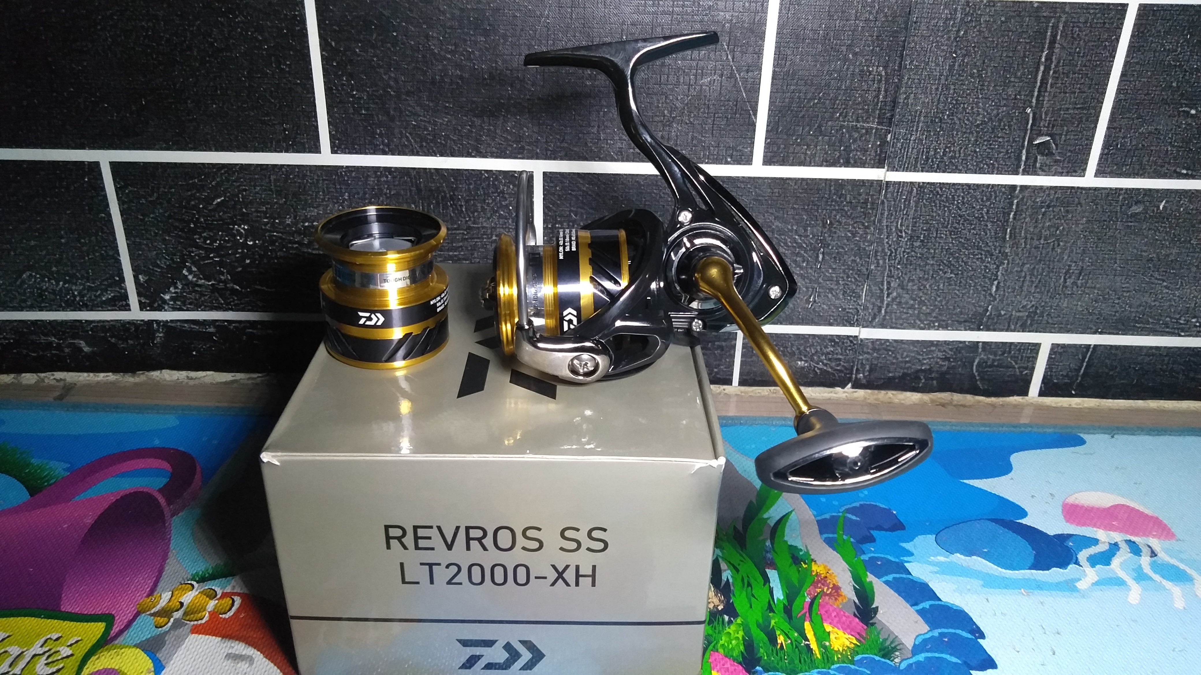 Reel Daiwa Revros SS LT 1000-6000 CXH Power handle doble spool